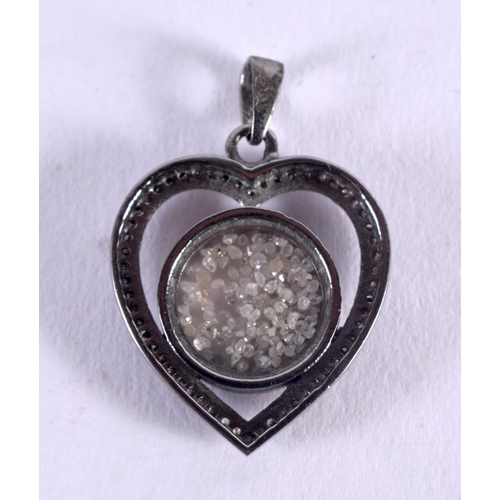 1072 - A SILVER AND DIAMOND HEART PENDANT. 6 grams. 3.25 cm x 2.25 cm.