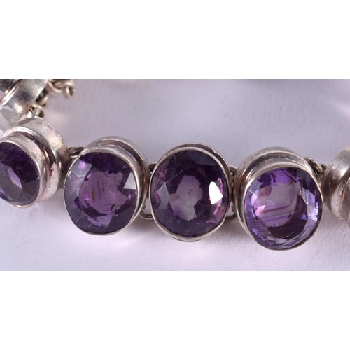 1096 - A SILVER AND AMETHYST BRACELET. 74.8 grams. 18 cm long.