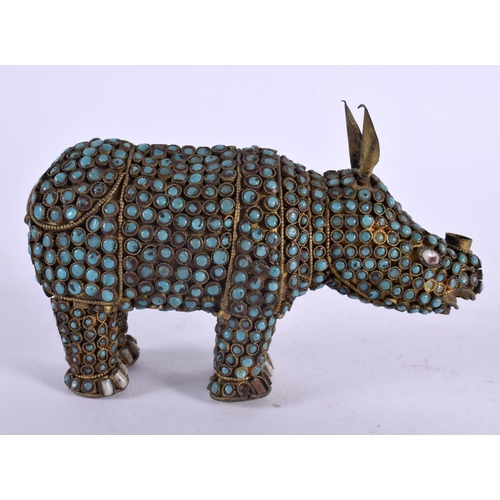 1105 - AN ANTIQUE TIBETAN TURQUOISE JEWELLED FIGURE OF A RHINOCEROS. 15 cm x 8 cm.