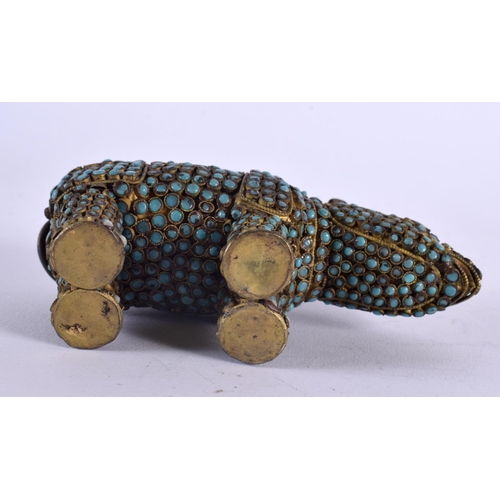 1105 - AN ANTIQUE TIBETAN TURQUOISE JEWELLED FIGURE OF A RHINOCEROS. 15 cm x 8 cm.
