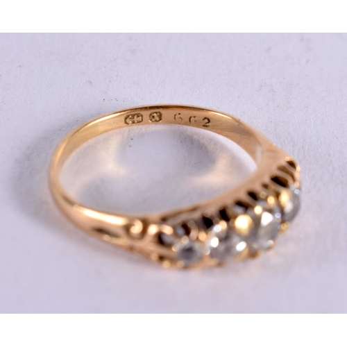 1112 - A GOLD AND FIVE STONE DIAMOND RING. 3 grams. M.