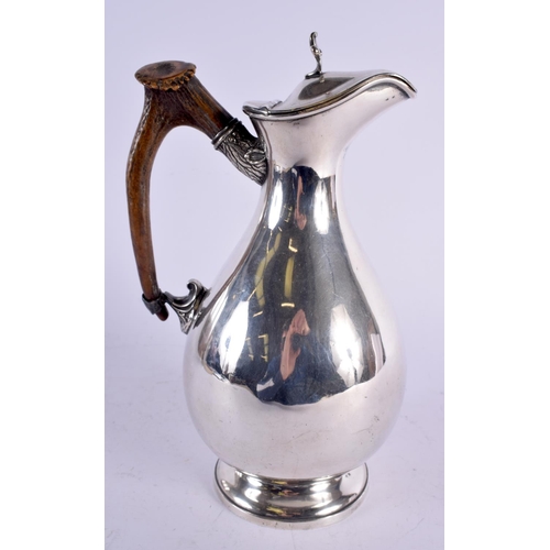 1119 - AN ANTIQUE JAMES DIXON & SON ANTLER HORN HUNTING CLARET JUG. 757 grams. 26 cm x 16 cm.