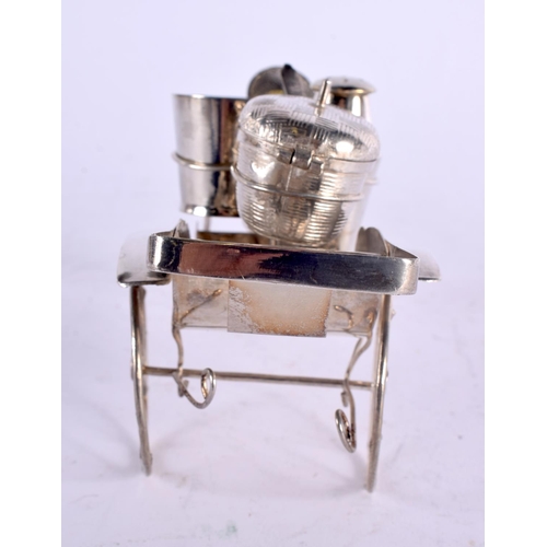 1121 - AN EARLY 20TH CENTURY CHINESE EXPORT WHITE METAL CRUET SET. 167 grams. 19 cm x 7 cm.