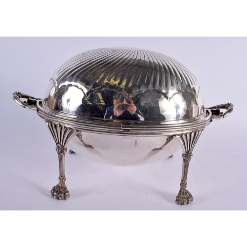 1124 - A LARGE VICTORIAN SILVER PLATED REVOLVING MEAT DISH with paw feet. 34 cm x 20 cm.