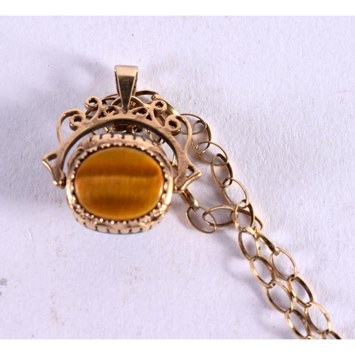 1163 - AN ANTIQUE 9CT GOLD AND AGATE NECKLACE. 9 grams. 60 cm long, spinner 2 cm x 2 cm.