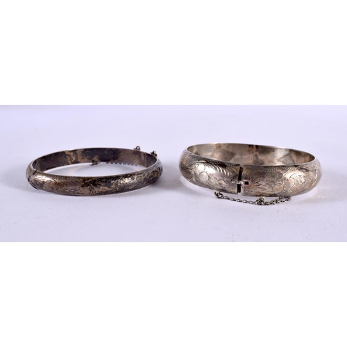 1190 - TWO SILVER BANGLES. 28 grams. 6 cm wide. (2)