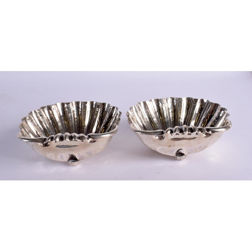 1214 - A LARGE PAIR OF 19TH CENTURY CONTINENTAL SILVER SHELL SALTS. 269 grams. 14 cm x 13.5 cm.