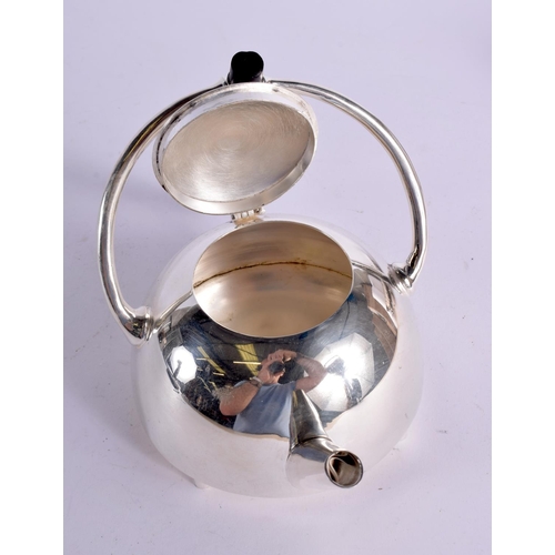 1217 - A CHRISTOPHER DRESSER STYLE SILVER PLATED TEAPOT AND COVER. 517 grams. 22 cm x 15 cm.