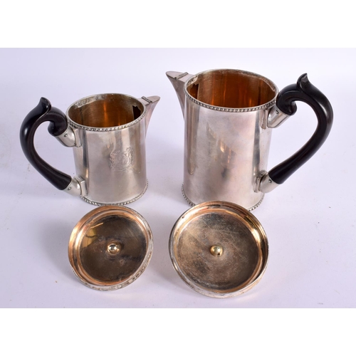 1221 - TWO UNUSUAL ANTIQUE CONTINENTAL SILVER COFFEE POTS. 871 grams. Largest 19 cm x 16 cm. (2)