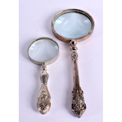 1223 - AN EDWARDIAN SILVER MAGNIFYING GLASS together with another. Smaller Chester 1906. 405 grams overall.... 