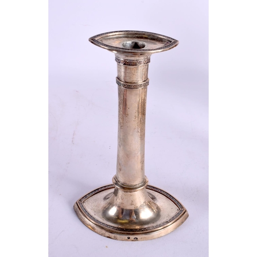 1233 - A SET OF FOUR ANTIQUE SILVER CANDLESTICKS. 1171 grams overall. 19.5 cm x 12.5 cm. (4)