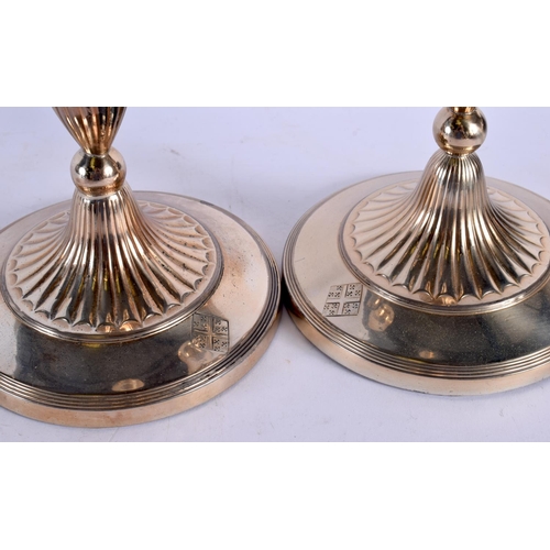 1246 - A MATCHED PAIR OF EARLY 19TH CENTURY ENGLISH SILVER CANDLESTICKS. 1435 grams overall. 30 cm x 15 cm.