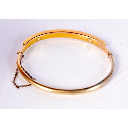 1262 - A VICTORIAN YELLOW METAL PEARL BANGLE. 11.3 grams. 6 cm x 5.25 cm.