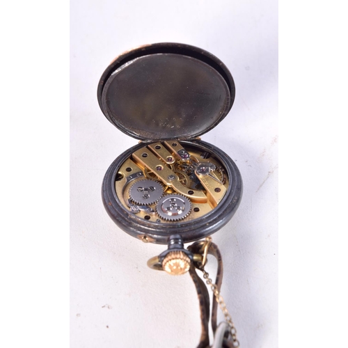 1266 - AN ANTIQUE GUN METAL FOB WATCH. 3.25 cm wide.