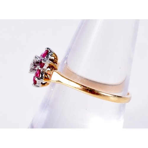 1270 - AN 18CT GOLD DIAMOND AND RUBY RING. 2.3 grams. N.