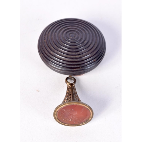 1290 - A REGENCY TORTOISESHELL SNUFF BOX together with an agate seal. 19.2 grams. 4.25 cm x 1.75 cm.