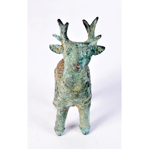 1330 - AN ANTIQUE MIDDLE EASTERN BRONZE DEER. 9.5 cm x 8 cm.