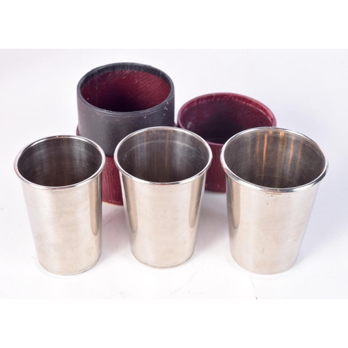 1331 - A CASED SET OF THREE HUNTING CUPS. 87 grams. Largest 7 cm x 5.75 cm. (4)