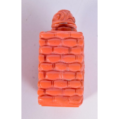 1362 - A CHINESE CORAL TYPE SNUFF BOTTLE. 7 cm x 4.5 cm.