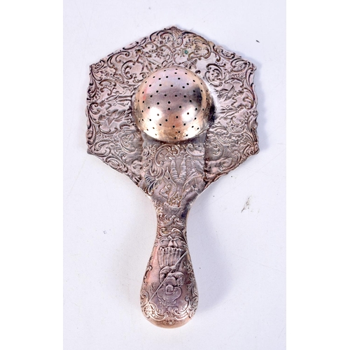 1365 - AN ANTIQUE SILVER TEA STRAINER. 75 grams. 16 cm x 9 cm.