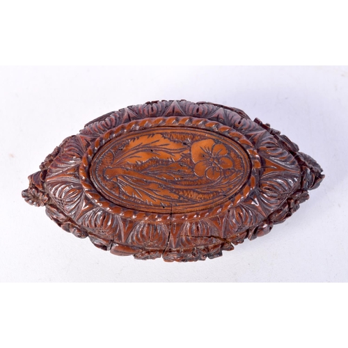 1370 - AN 18TH/19TH CENTURY CONTINENTAL CARVED COQUILLA SNUFF BOX. 40 grams. 8.5 cm x 4.75 cm.