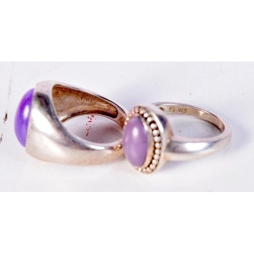 1377 - TWO SILVER AND AMETHYST RINGS. N/O. 11 grams. (2)