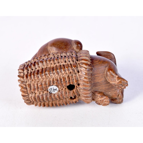 1381 - A JAPANESE HARDWOOD RAT NETSUKE. 5 cm x 3.75 cm.