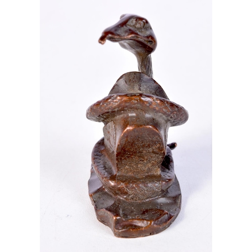 1387 - A JAPANESE BRONZE SNAKE OKIMONO. 146 grams. 6 cm x 5.25 cm.