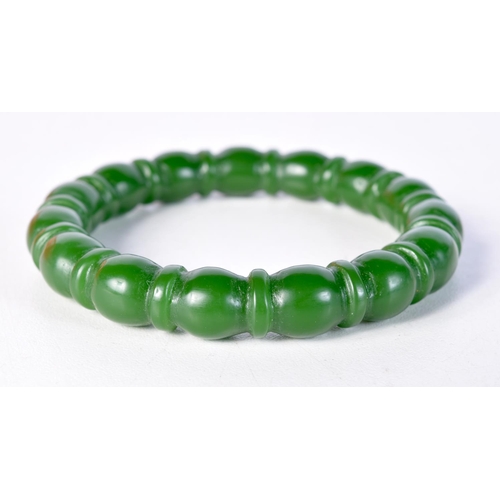 1392 - GREEN JADE BANGLE. Internal diameter 5.6cm