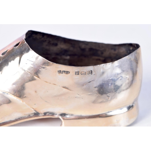 1397 - A SILVER SHOE WITH WOODEN SOLE. Hallmarked Birmingham 1911. 12.7cm x 4.6cm x 4.8cm, total weight 83g