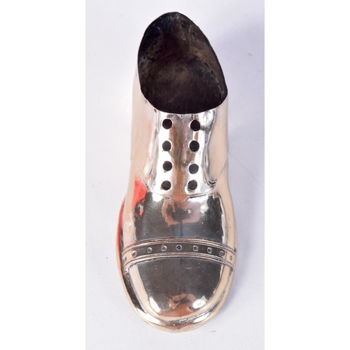 1397 - A SILVER SHOE WITH WOODEN SOLE. Hallmarked Birmingham 1911. 12.7cm x 4.6cm x 4.8cm, total weight 83g