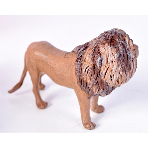 1409 - COLD PAINTED BRONZE LION. 6.7cm x 10.3cm x 4.1cm