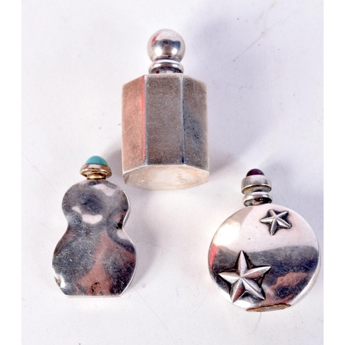 1430 - THREE CONTINENTAL SILVE SCENT BOTTLES. Stamped 925, Largest 4.7cm x 2.4cm, total weight 49.7g (3)