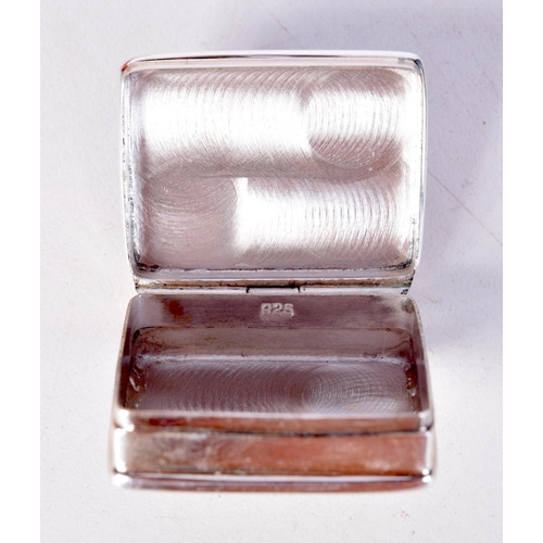 1436 - A SILVER PILL BOX WITH LID DEPICTING A SCENT FROM FAWLTY TOWERS. Stamped 925, 1.3cm x 2.6cm x 3.1cm,... 