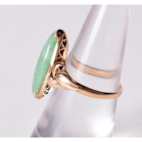 1457 - A 14CT GOLD RING WITH A JADE SOLITAIRE SETTING. Stamped 14K, Size L, weight 3g