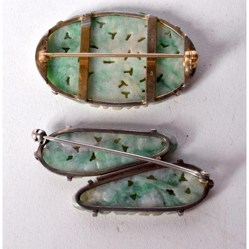 1459 - TWO PIERCED JADE BROOCHES. Largest 3.9cm x 2.5cm (2)