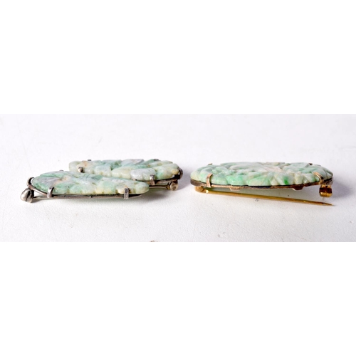 1459 - TWO PIERCED JADE BROOCHES. Largest 3.9cm x 2.5cm (2)