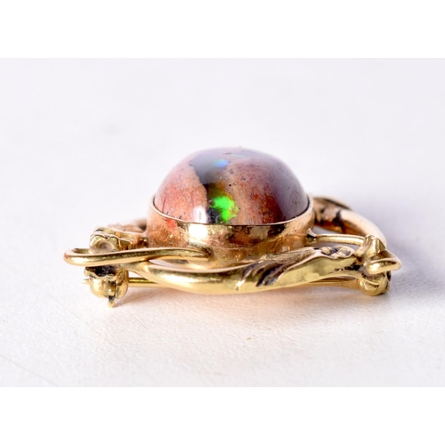 1463 - AN 18CT GOLD MOUNTED OPAL BROOCH. Stamped 18K, 2.8cm x 2.7cm, weight 10.3g