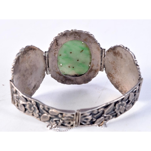 1481 - A 19TH CENTURY CHINESE SILVER AND JADE BRACELET. 37.3 grams. 6 cm wide internal width.