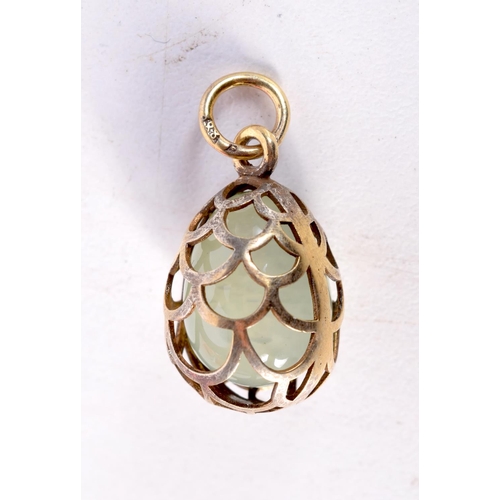 1492 - A RUSSIAN SILVER AND JADE EGG PENDANT. 5.3 grams. 2.25 cm x 1.5 cm.