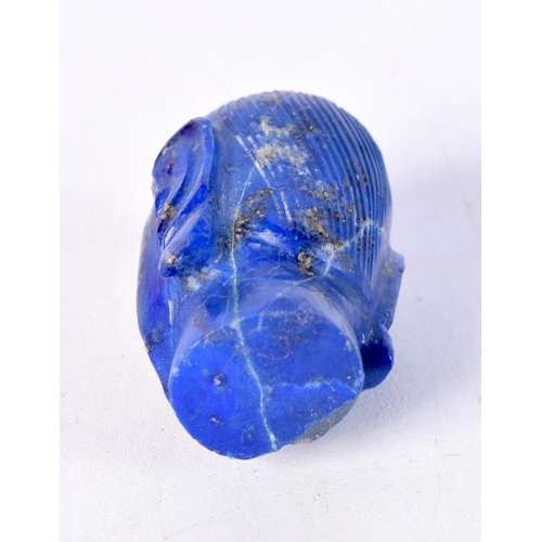 1497 - A 19TH CENTURY SOUTH EAST ASIAN CARVED LAPIS LAZULI HEAD OF A BUDDHA. 5 cm x 3 cm.