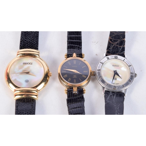 1504 - THREE GUCCI WATCHES. 3 cm wide. (3)