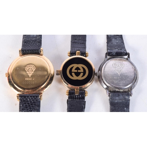 1504 - THREE GUCCI WATCHES. 3 cm wide. (3)