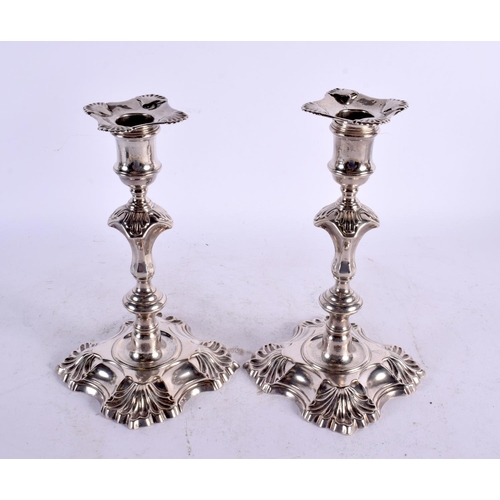 1539 - A GOOD PAIR OF GEORGE II SILVER CANDLESTICKS by William Gould. London 1748. 1106 grams overall. 21.5... 