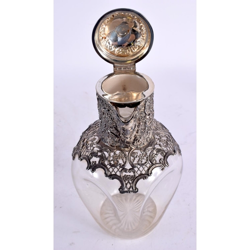 1543 - A VICTORIAN SILVER CLARET JUG. 771 grams ovrerall. London 1897. 23 cm x 16 cm.