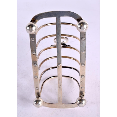 1549 - AN ART DECO SILVER TOAST RACK. London 1917. 281 grams. 16 cm x 13 cm.