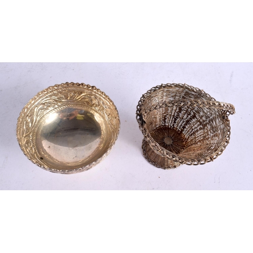 1565 - A WHITE METAL BOWL and a similar basket. 165 grams. Largest 10 cm wide. (2)