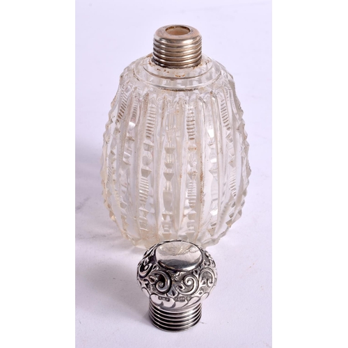 1591 - AN EDWARDIAN SILVER AND CUT GLASS SCENT BOTTLE. Birmingham 1901. 314 grams overall. 13 cm x 7 cm.