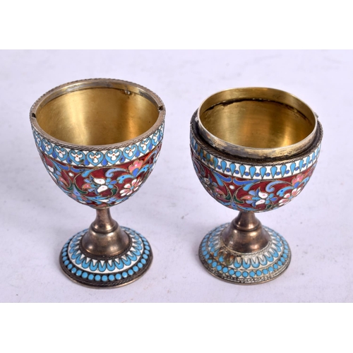 1595 - A 19TH CENTURY RUSSIAN SILVER AND ENAMEL DOUBLE EGG ON STAND. 111 grams. 12.25 cm x 4.5 cm.