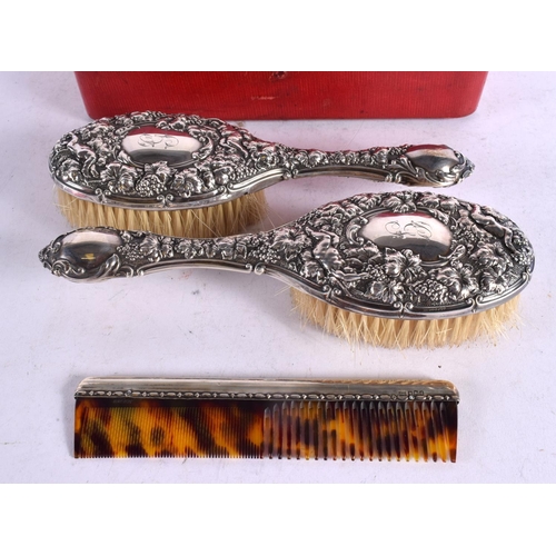 1617 - A MATCHED PAIR OF SILVER DRESSING TABLE BRUSHES. Sheffield 1921 & London 1902. 422 grams overall. 26... 